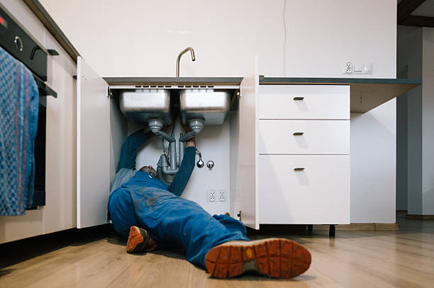 Professional Emergency Plumber technician working in Swain, NY